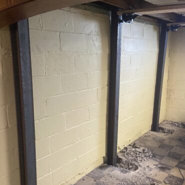 Wall Stabilization support rods in a basement